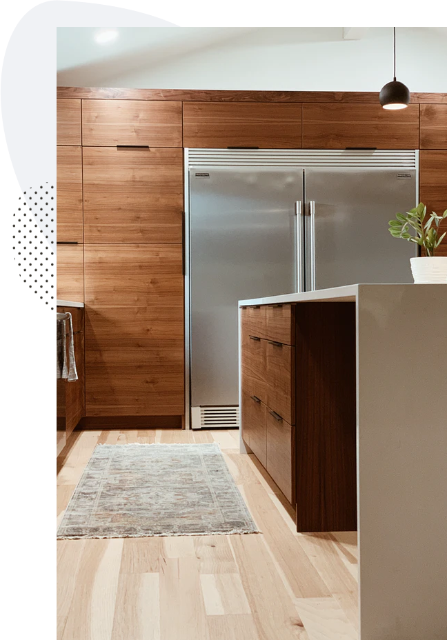 Walnut kitchen cabinetry and island in an Austin home