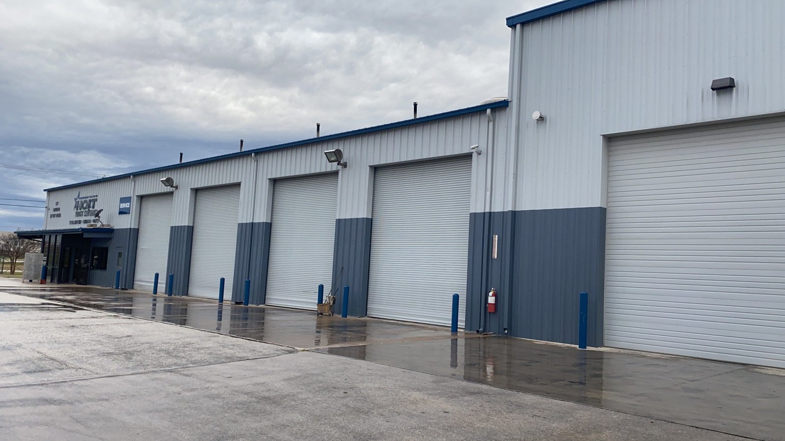 Repainted warehouse bay doors in Austin