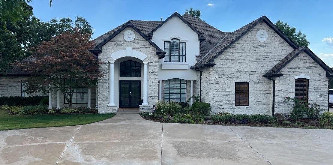 Brick estate home in Austin after limewash