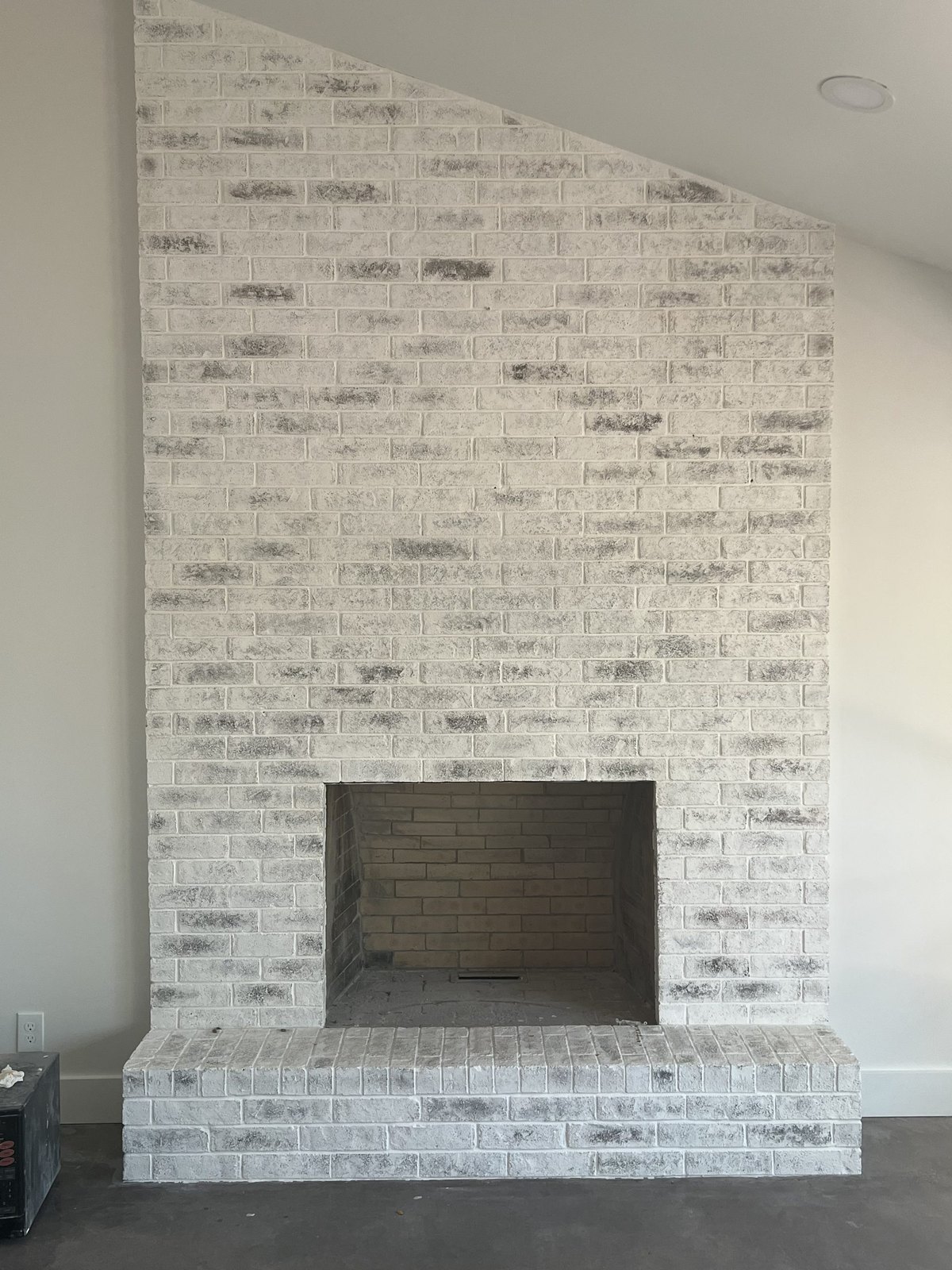 Brick fireplace in Austin after limewash