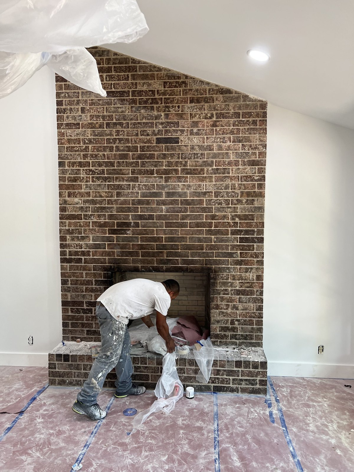 Brick fireplace in Austin before limewash