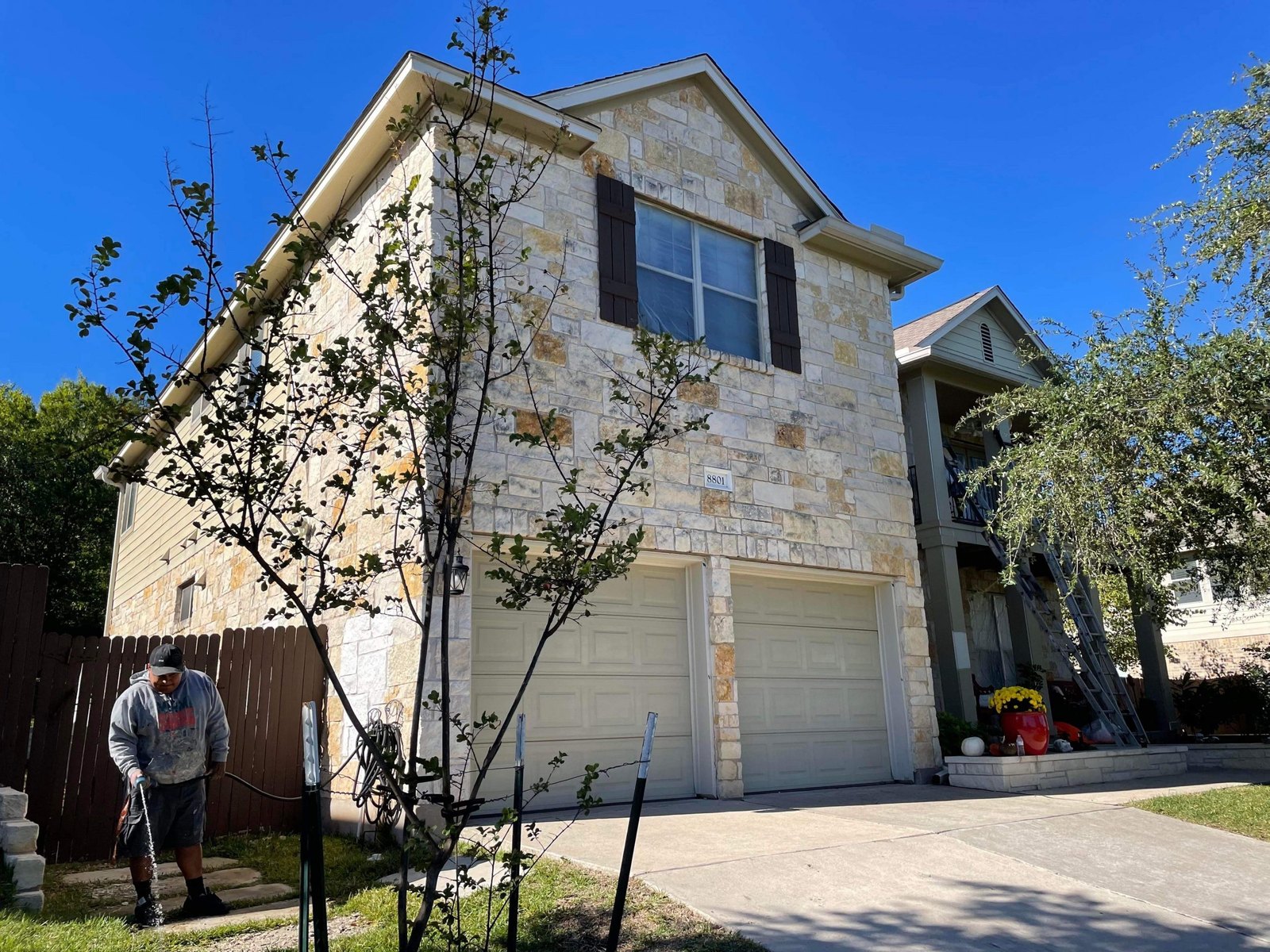 Stone home in Austin before limewash