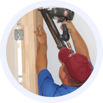 Carpenter installing interior trim in an Austin home