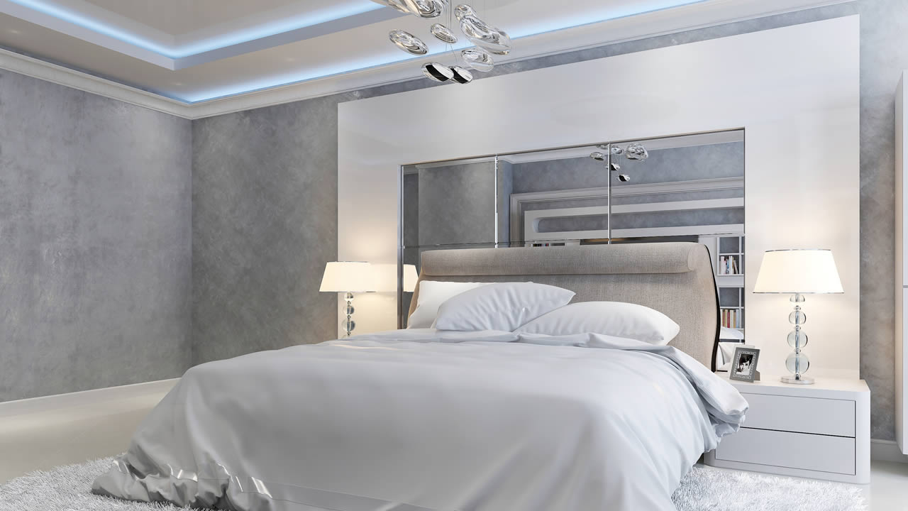 Polished Venetian plaster feature wall in an Austin bedroom