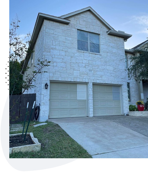 Finished mortar-washed stone home in Austin with a light, even coverage