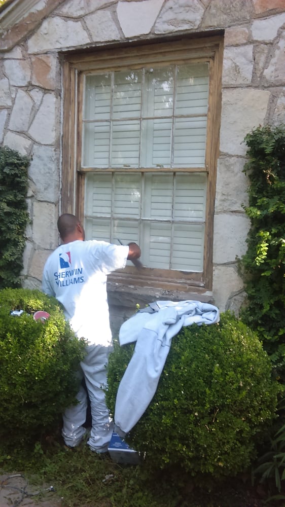 APP painter repairing original window trim in Austin